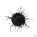Close up of black feather flower brooch patch detail showing 9.5cm size and beaded center. - Black