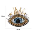 Gedetailleerd op de foto van een geborduurde boze oog patch, kralen voor kleding en accessoires. - Maat 6