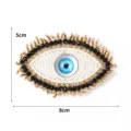 Handgemachte Perlen boeser Blick Aufnaher Strass bestickte Abzeichen Kleidung Zubehor 8x5cm - Blaues Auge mit Wimpern / Weiß