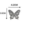 Detailaufnahme eines glitzernden Kristall-Strass-Schmetterlings-Patches für DIY-Bastelarbeiten. - Kleiner Schmetterling Stil / Weiß