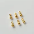Dettaglio di piccoli ciondoli connettori a goccia dorati per la creazione di gioielli fai da te - Ciondolo a Goccia / 6x3mm (1 Confezione 1000 Pz)