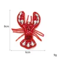 Close-up of the handmade red beaded lobster patch, showing sparkling rhinestones and fine beadwork. - Lobster 4 Style
