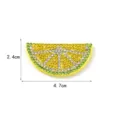 Close-up detail of the sparkling rhinestone fruit patch, showing precise dimensions and crystal texture. - Lemon
