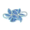 Nahaufnahme Detail des glitzernden blauen Strass Blume Stoff Flicken DIY Kleidung Zubehör - Blau
