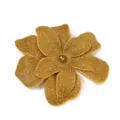 Close-up detail of the luxurious golden double-layer rhinestone flower accessory shining brightly. - Golden