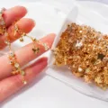 Catena per gioielli DIY con farfalla e strass dorata accessorio per collane e cavigliere. - oro kc