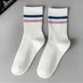 Women's white mid-calf socks featuring trendy blue and pink stripes, soft and breathable. - White Blue Pink Striped
