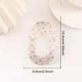 Pince à cheveux transparente à motifs floraux et bords ondulés, accessoire élégant pour femmes. - Hibiscus