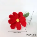Handmade crochet red flower with green leaf and stem, perfect gift option for festival events. - Cosmos Red