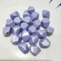 Detailed shot of pastel purple irregular faceted acrylic loose beads for DIY jewelry making. - Light Purple