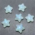 Mermaid glow star beads detail, chubby star shaped handmade DIY jewelry accessory close up. - Light Green