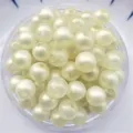 Primer plano de cuentas redondas de acrílico amarillo claro para joyería artesanal DIY. - 8mm/Aprox 1800pz / Amarillo Claro Iridiscente