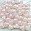 Detailed view of 10mm acrylic heart iridescent beads for DIY jewelry necklace making. - 10mm Chubby Heart Luminous / Approx 1170 Pcs / Light Pink / Luminous