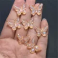 Resin iridescent butterfly charms for DIY phone chains jewelry crafts and handmade accessories. - 14x19mm 670 Pieces / Orange