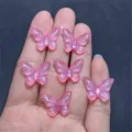 Pink glitter resin butterfly charms detailed view for DIY phone chains and craft accessories. - 14x19mm 670 Pieces / Rose Red