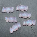 Detalle de cuentas de caramelo sirena de resina, ideal para dijes de teléfono y joyería. - Rosa Claro