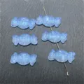 Primer plano de cuentas de resina en forma de caramelo azul para joyería DIY y accesorios. - Degradado Azul