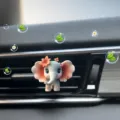 Clip per bocchetta d'aria auto elefante carino, bel design floreale profumo per interni auto. - Carino Elefante con Fiori