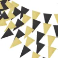 Black and gold glitter triangle bunting garland closeup for graduation party decor. - Glitter Gold & Black