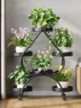 Multi-tier metal plant stand with wheels, black iron flower rack for living room balcony. - Thickened 6 Pots with Wheels / Woven Black