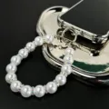 Handmade pearl phone charm strap elegant white beaded wrist lanyard for phone case accessories - Pearl Style