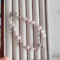 Handmade crystal beaded phone wrist strap detail, pink square beads and silver charm, elegant. - Pink Jade