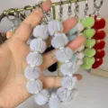 Fluffy pom pom pearl phone charm and bag keychain, cute winter plush accessory for women. - Gray