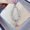 Handmade lampwork crystal mushroom charm detail view clear beaded phone lanyard accessory - Transparent Pink Mushroom