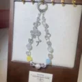 Crystal phone charm detail view, sparkling beaded pendant for bags and mobile phones. - Clear & Color-Changing