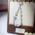Luxury original design crystal beaded phone charm with alloy bow, sparkling key chain pendant. - White