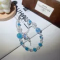 Exquisite blue crystal beaded phone charm with butterfly and moon metal pendant for cute style cases. - Moon Butterfly Pendant / Blue