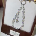 Crystal beaded phone charm with dazzling rhinestones and cute pendant, short wrist strap. - White