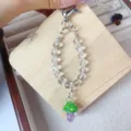Handmade crystal beaded phone charm with cute lampwork glass mushroom pendant, stylish accessory. - Green Mushroom