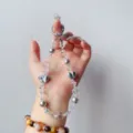 Handmade crystal beaded phone charm wrist strap with alloy hearts for women luxury decor. - Gray Heart