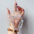 Sparkling crystal bow beaded phone charm and keychain with dreamy aurora star pendants. - Handmade Woven Bow With White Pentagram Style