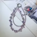 Elegant purple crystal beaded phone charm wrist strap with silver bow for women daily use. - Muted Purple