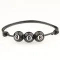 Braccialetto in corda intrecciata nera con tre perle da biliardo 8 per uno stile sportivo. - Biliardo Nero Otto