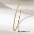 Elegant single-row pavé cubic zirconia gold-plated bangle bracelet for daily luxury wear. - Gold Style (AB09482K-523)
