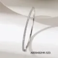 Close-up detail shot of the stunning single row zircon bangle bracelet with secure metal clasp. - Silver Style (AB09482HK-523)