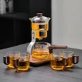 Ensemble théière en verre kung-fu avec poignée en bois, infuseur à thé résistant pour bureau. - Théière Lingdong (avec 4 Tasses) / Transparent