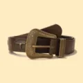 Detailed view of women vintage brown leather belt with ornate brass floral buckle and bull head. - 110x3.3cm / Coffee