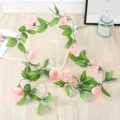 Artificial pink rose vine detail shot, perfect for home decor, wedding party, and wall hanging. - Sunset