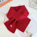 Red knitted crisscross scarf detail, cozy winter wool neck warmer, stylish minimalist accessory. - Wine Red