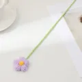 Décoration florale au crochet faite à la main, jolie fleur violette avec tige verte pour la maison. - Bleu