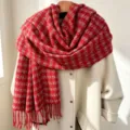 Red plaid winter scarf detail, soft tassel fringe, warm cozy fabric for cold weather. - Red Pink Fine Plaid
