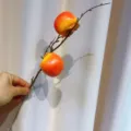 Branche de fruit artificielle déco maison simulation grenade plante ornement pour fête table. - Petit Kaki Jaune à Deux Têtes