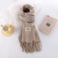 Comoda sciarpa calda invernale effetto cashmere beige, con frange e vista dettagliata. - Farina d'Avena