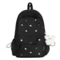 Black canvas backpack with cute embroidered pastry patterns and soft plush keychain for daily use. - Single Bag / Black
