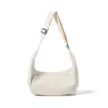 Detail shot of casual white nylon crossbody shoulder bag, lightweight commuter travel bag. - White
