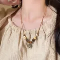 Collana con ciondolo in perline di legno in stile cinese retrò, elegante catena per donna. - Collana Stile Ghianda / Marrone